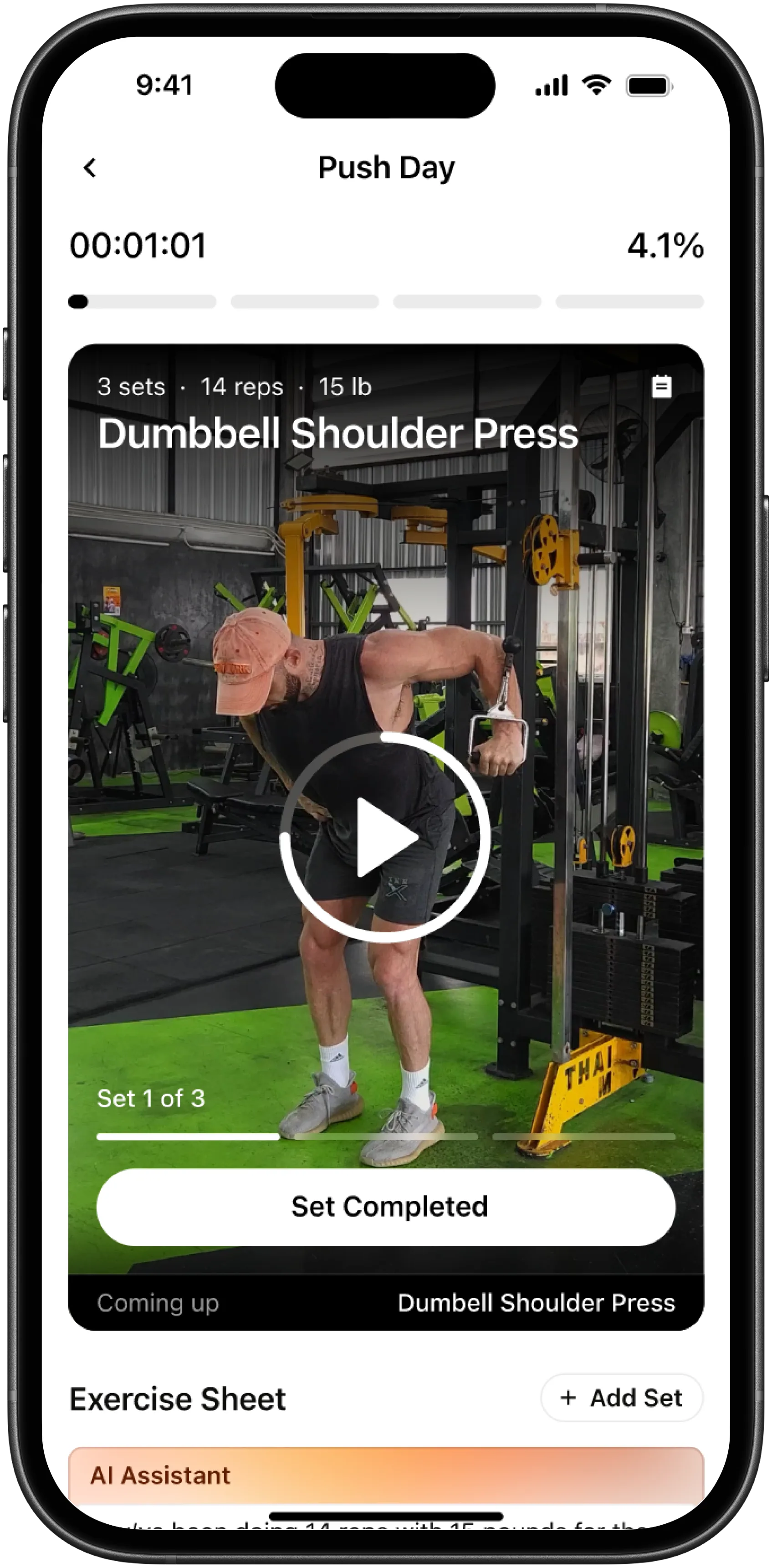 Active workout screen showing Dumbbell Shoulder Press with video